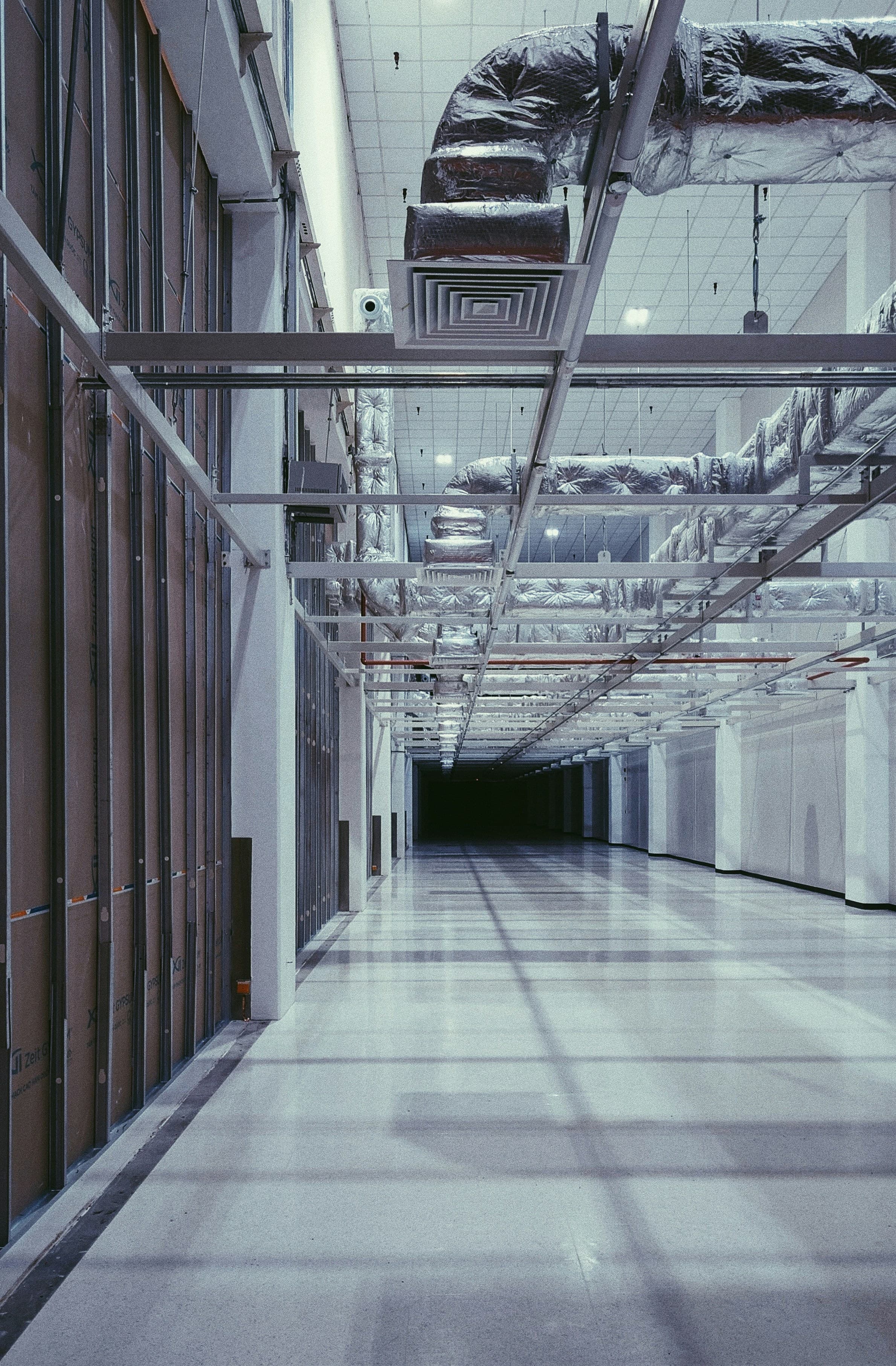 Insulated ventilation ductwork in a commercial corridor